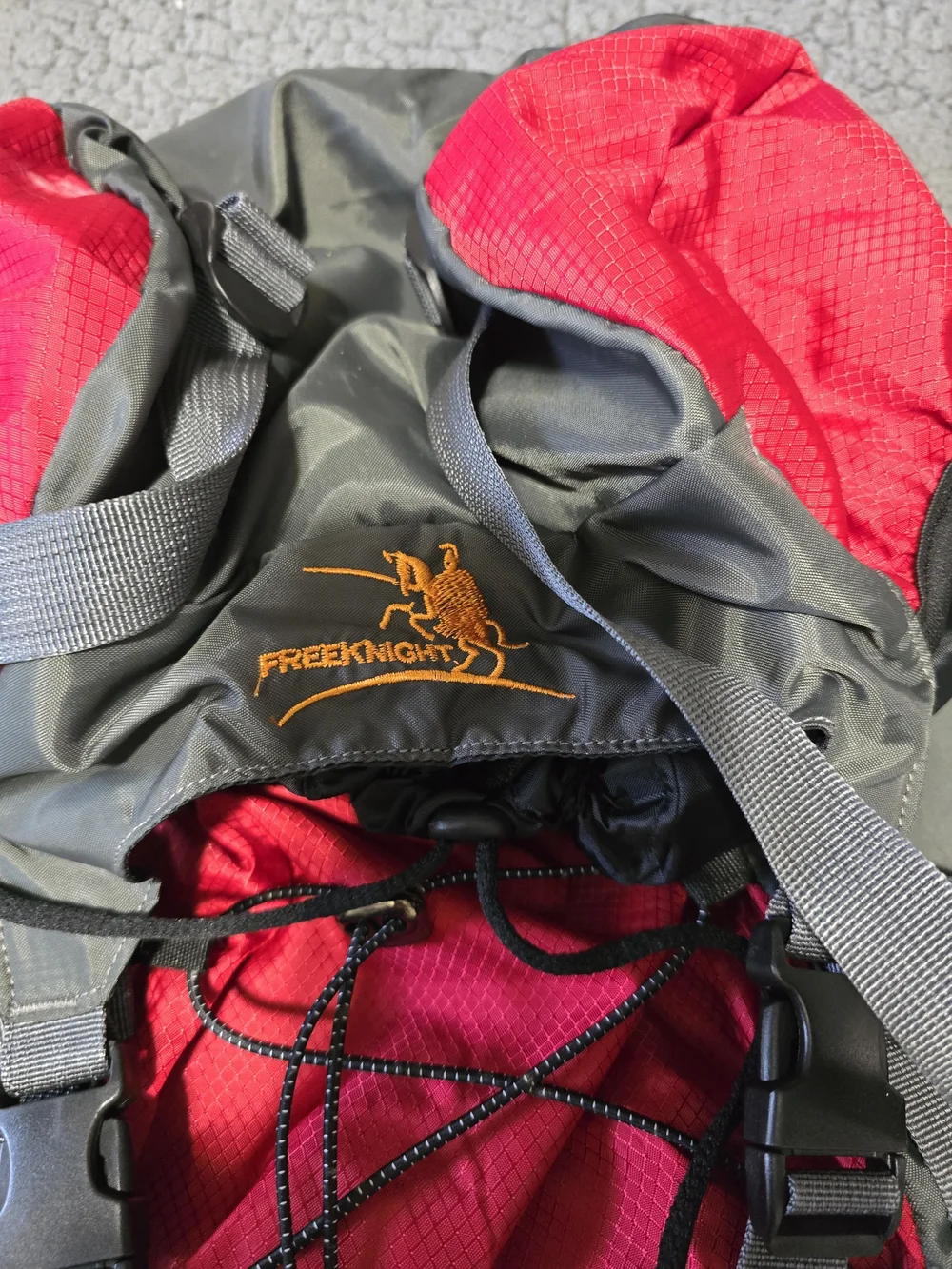 Rugged Red & Gray Outdoor Backpack with Bungee Storage